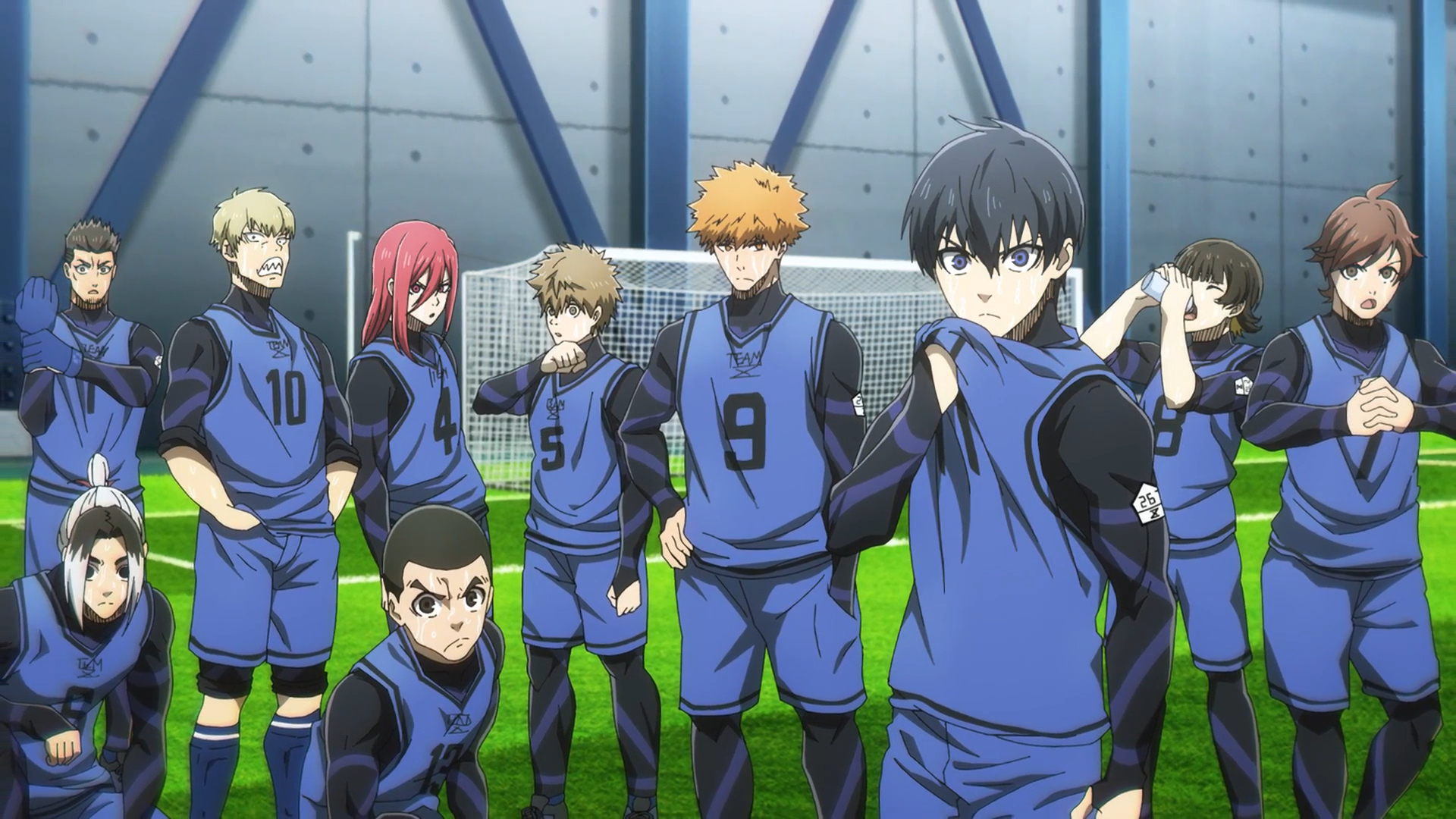 HD PC desktop wallpaper featuring the main characters from the anime Blue Lock in their blue soccer uniforms on a field with stadium lighting.