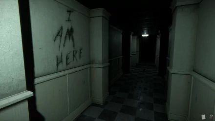 A haunting corridor from the video game The Mortuary Assistant, featuring eerie lighting and the unsettling phrase I AM HERE scrawled on the wall. HD desktop wallpaper.