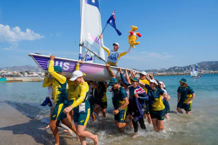 HD background showcasing dinghy sailing, celebrating Australia at the Olympic Games Paris 2024. A vibrant representation of sportsmanship and competitive spirit.