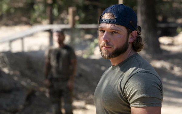 A sleek HD desktop wallpaper featuring imagery from the TV show Seal Team, capturing the intensity and teamwork of elite military operatives.