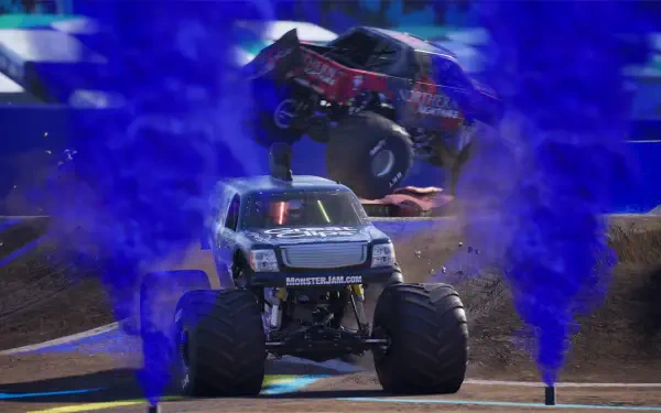 High-definition desktop wallpaper featuring intense action from the Monster Jam Showdown, showcasing a monster truck performing a stunt with blue smoke effects in the background.