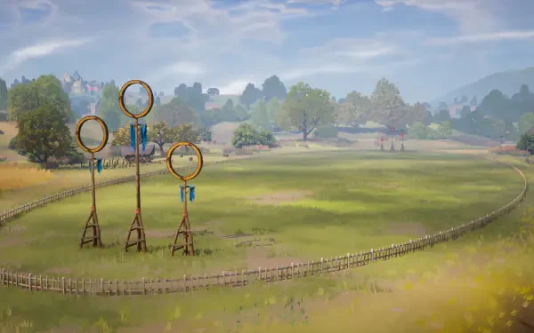HD wallpaper featuring a serene quidditch pitch from the video game Harry Potter: Quidditch Champions, showcasing three iconic goal hoops set against a beautiful landscape.