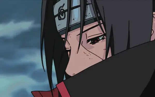A high-definition desktop wallpaper featuring Itachi Uchiha from Naruto, showcasing his intense expression and Mangekyō Sharingan. An engaging anime background for fans.