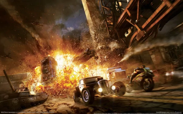 HD PC desktop wallpaper of the MotorStorm video game: explosive off-road race with a vintage car and motorcycle tearing past a fiery bridge collapse.