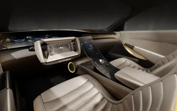 A sleek interior of the DS SM Tribute car, showcasing modern design elements and advanced dashboard features, set against a dark background. 4K Ultra HD desktop wallpaper.