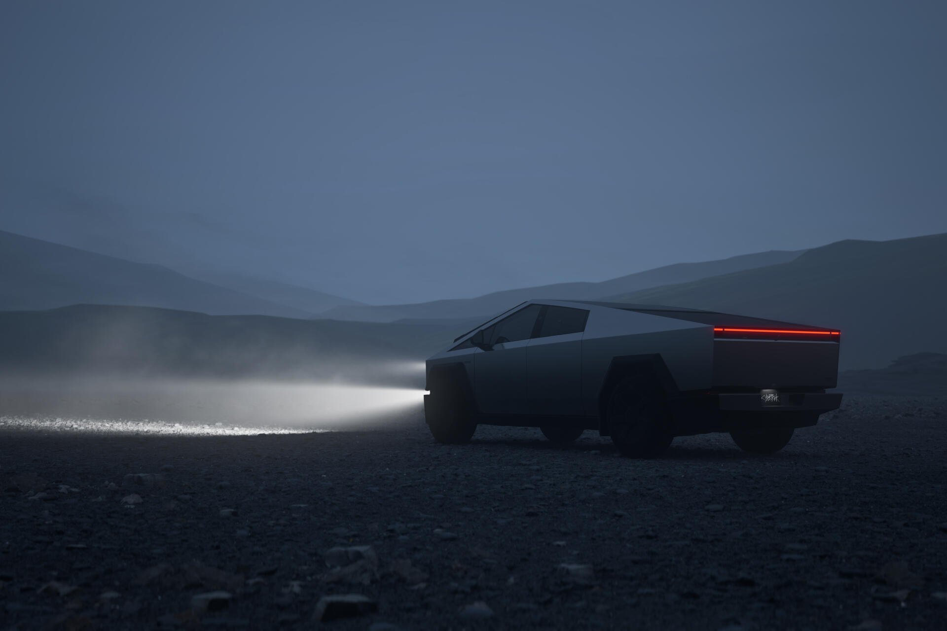 A sleek Tesla Cybertruck illuminated by its headlights, set against a moody, misty landscape, creating a striking visual for a 4K Ultra HD desktop wallpaper.