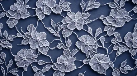 An intricate lace pattern featuring delicate flowers and leaves, set against a dark background, creating a stunning 4K Ultra HD desktop wallpaper.