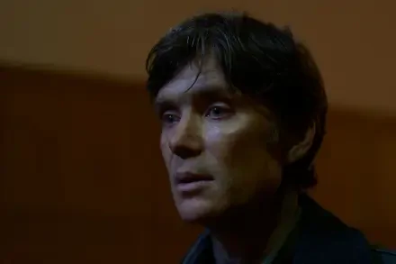 Cillian Murphy in a dramatic moment from *Small Things Like These*, captured in a high-definition desktop wallpaper, showcasing his intense expression in a moody setting.