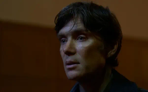 Cillian Murphy in a dramatic moment from *Small Things Like These*, captured in a high-definition desktop wallpaper, showcasing his intense expression in a moody setting.