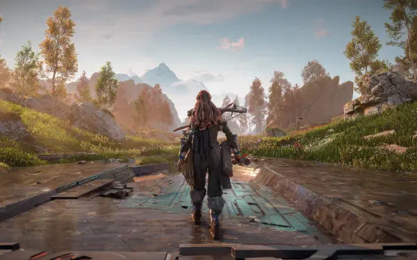 Aloy from Horizon Zero Dawn stands confidently in a vibrant, lush landscape, embodying the essence of a skilled hunter in this stunning 4K Ultra HD wallpaper.