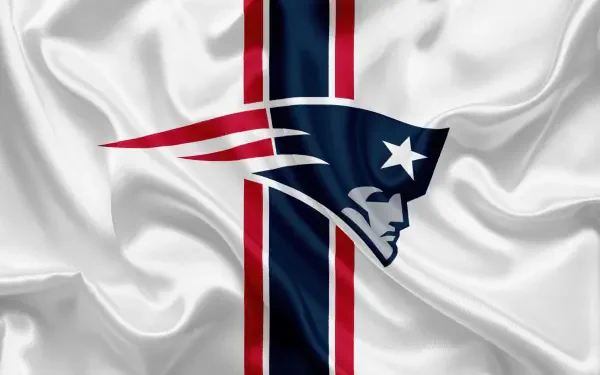 New England Patriots logo displayed on a flag with a flowing design. This 4K Ultra HD wallpaper showcases team spirit for NFL fans.