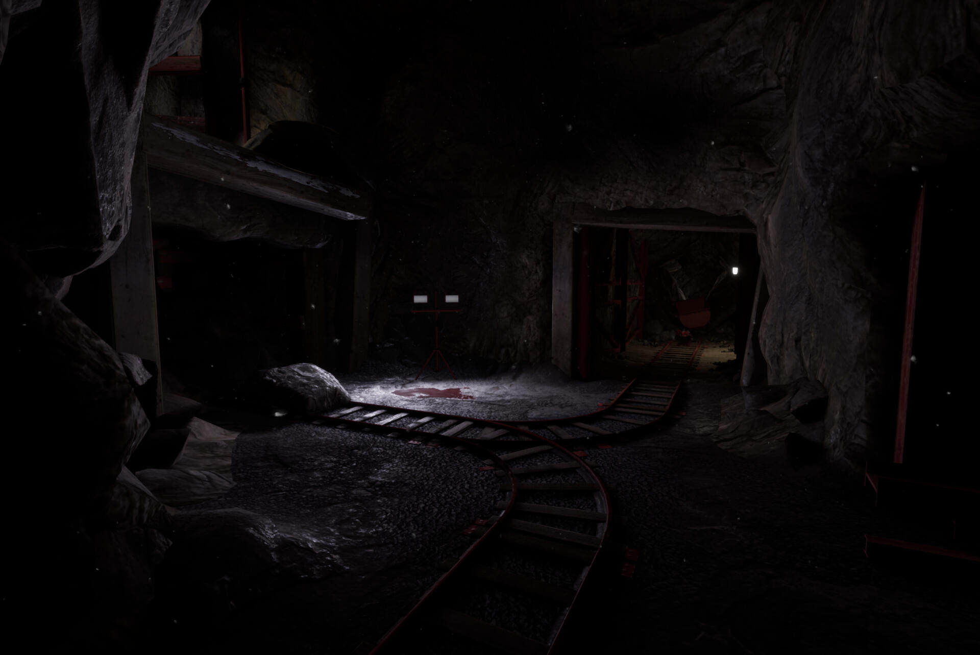 A dark, atmospheric scene from Poppy Playtime: Chapter 4 features a dimly lit environment with a winding track and eerie shadows, creating a sense of suspense and intrigue.