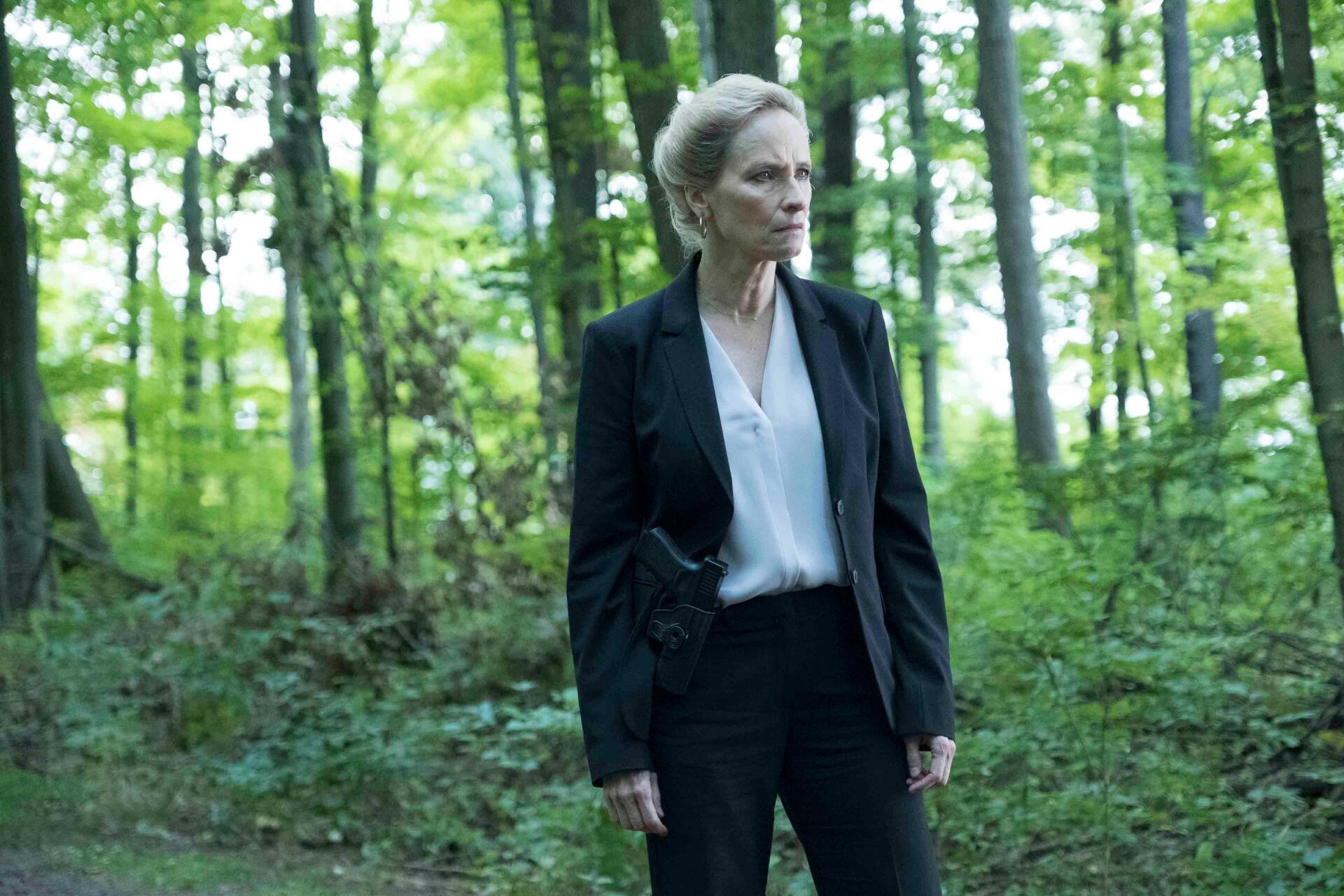 A character from the TV show The Boys (2019) stands in a lush green forest, wearing a dark suit and looking intently into the distance. This image is a 4K Ultra HD PC desktop wallpaper.