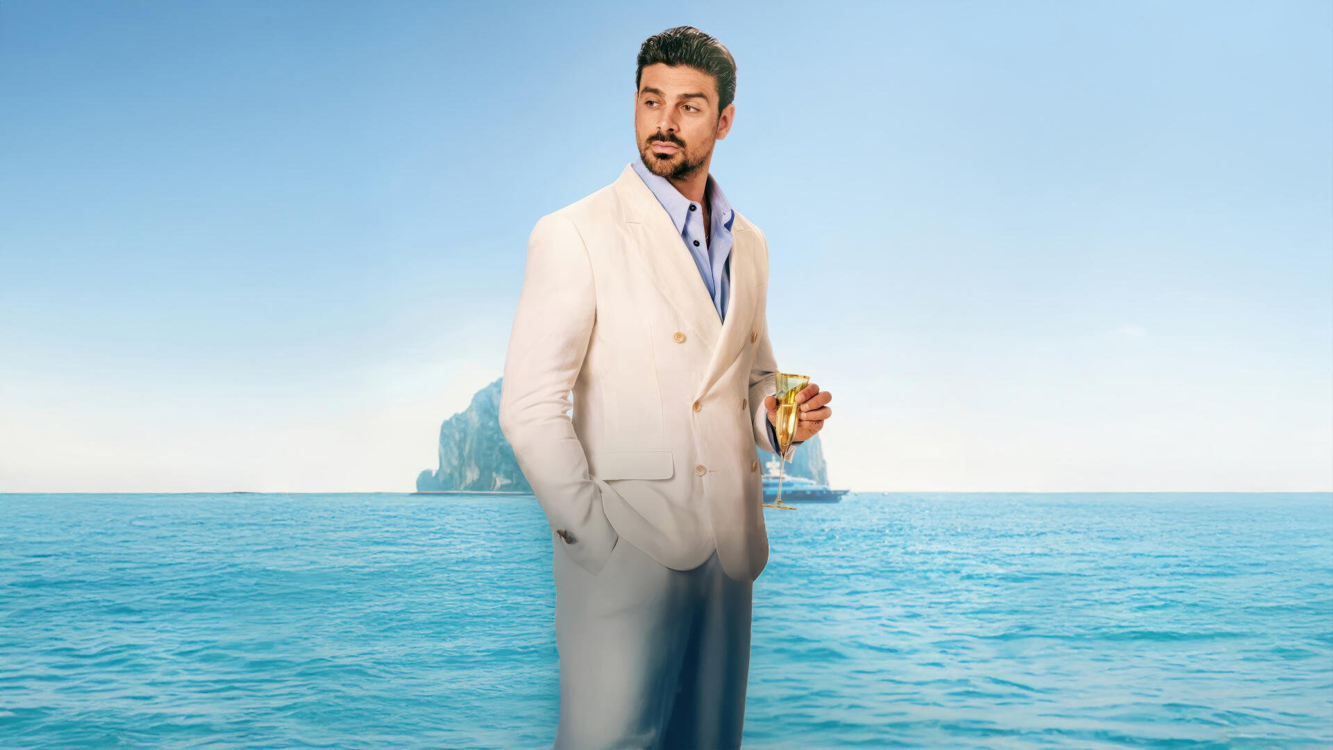Michele Morrone in a white suit holding a drink, standing against a clear blue ocean backdrop from the movie Another Simple Favor, 4K Ultra HD PC wallpaper.