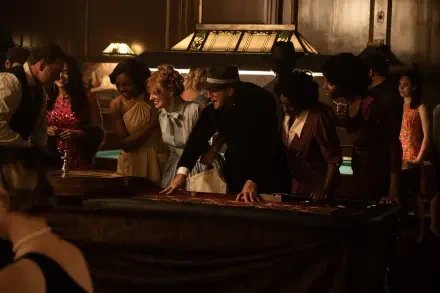 A scene from the movie Queen of the Ring, featuring a group of elegantly dressed individuals gathered around a casino table in a vintage setting. 4K Ultra HD desktop wallpaper.