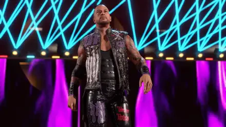 A dynamic scene from WWE 2K25 featuring a muscular wrestler in a stylish outfit, confidently walking onto the stage with vibrant blue and purple lighting in the background.
