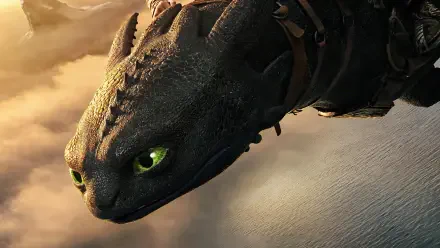 Toothless from *How to Train Your Dragon (2025)* soars through the sky in this stunning 4K Ultra HD desktop wallpaper, showcasing his fierce beauty and enchanting green eyes.