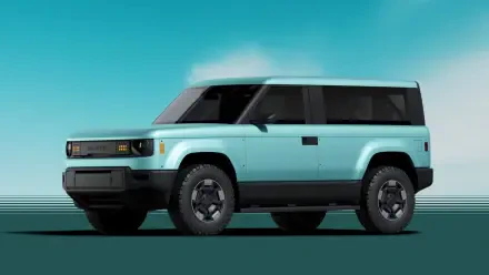 A cyan SUV from Slate Auto, showcasing a modern design against a serene backdrop, makes for an eye-catching HD desktop wallpaper.