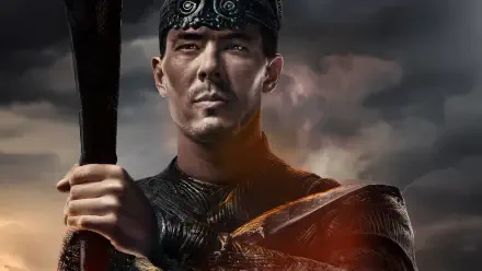 4K Ultra HD Mortal Kombat 2 (2025) PC desktop wallpaper featuring a determined warrior holding a weapon against a dramatic, cloudy background.