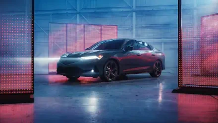 8K Ultra HD PC desktop wallpaper: Acura Integra A-Spec sedan in an industrial studio, dramatic colored lighting reflecting off its contours.