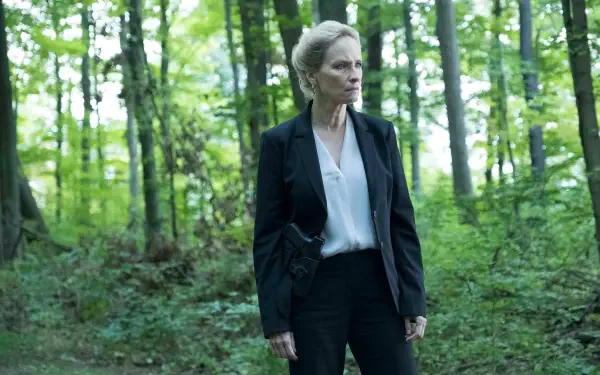 A character from the TV show The Boys (2019) stands in a lush green forest, wearing a dark suit and looking intently into the distance. This image is a 4K Ultra HD PC desktop wallpaper.