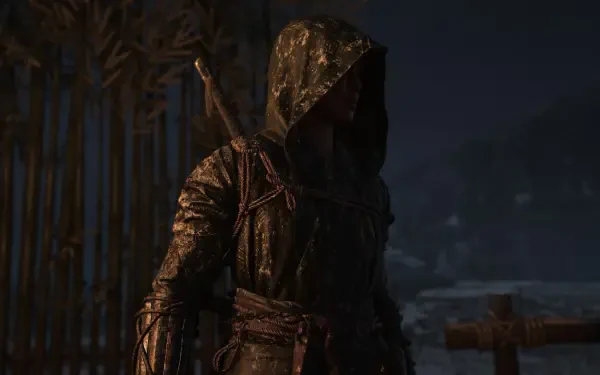 A character from Assassin's Creed Shadows stands cloaked and mysterious in a dark, atmospheric setting, creating an immersive 4K Ultra HD wallpaper for PC desktops.