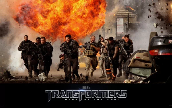 HD PC desktop wallpaper featuring an intense action scene from the movie Transformers: Dark of the Moon, with soldiers running amidst a massive explosion.