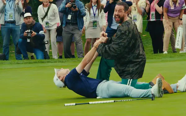 HD PC desktop wallpaper featuring a joyful scene from the movie Happy Gilmore 2 with Adam Sandler celebrating on the golf course surrounded by an excited crowd.