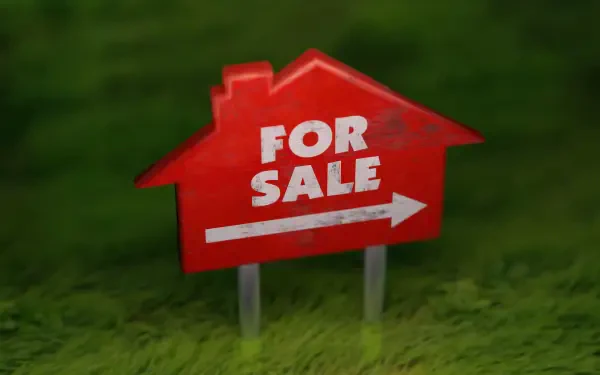 HD PC desktop wallpaper showing a red house-shaped real estate For Sale sign with an arrow planted in green grass, advertisement-style background.