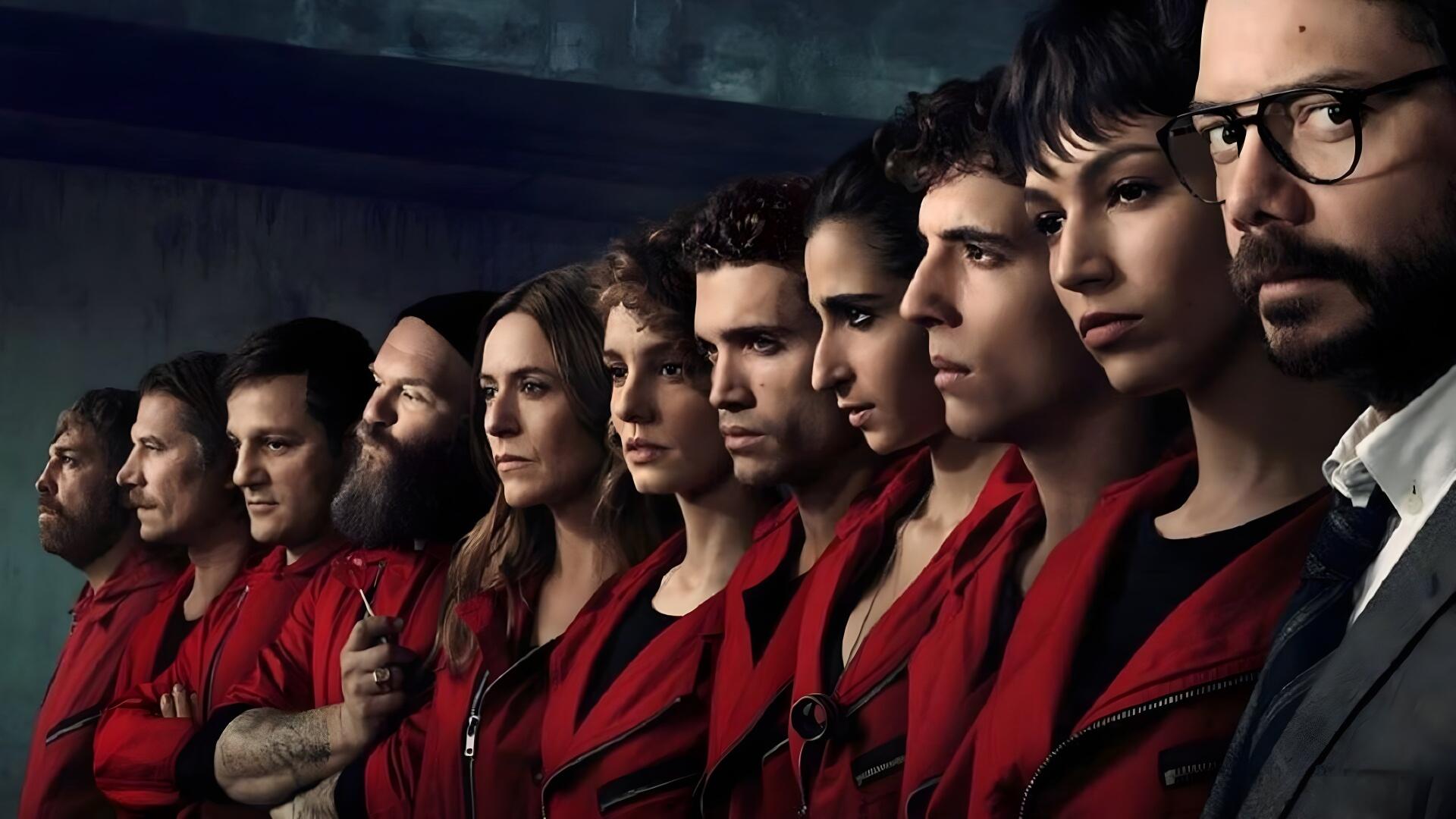 Money Heist 4K Ultra HD PC desktop wallpaper: a line of people in red jumpsuits with intense, determined expressions.