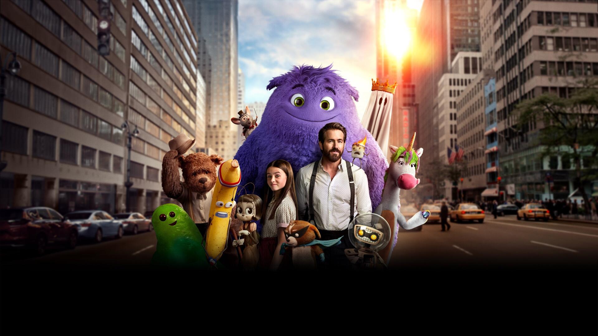 IF (2024) 4K Ultra HD PC desktop wallpaper: a man and woman stand among playful, colorful fantasy creatures — a giant purple monster and smaller whimsical companions — on a sunlit city street.
