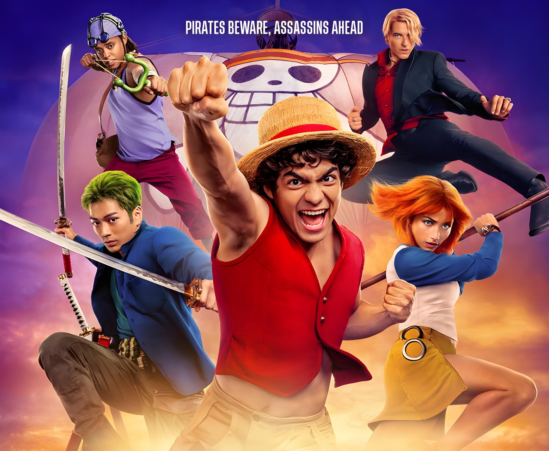 One Piece (Live Action) TV show 4K Ultra HD PC desktop wallpaper: Luffy thrusts a fist forward with Zoro and Nami flanking him, vivid purple-orange sky and Jolly Roger emblem behind.