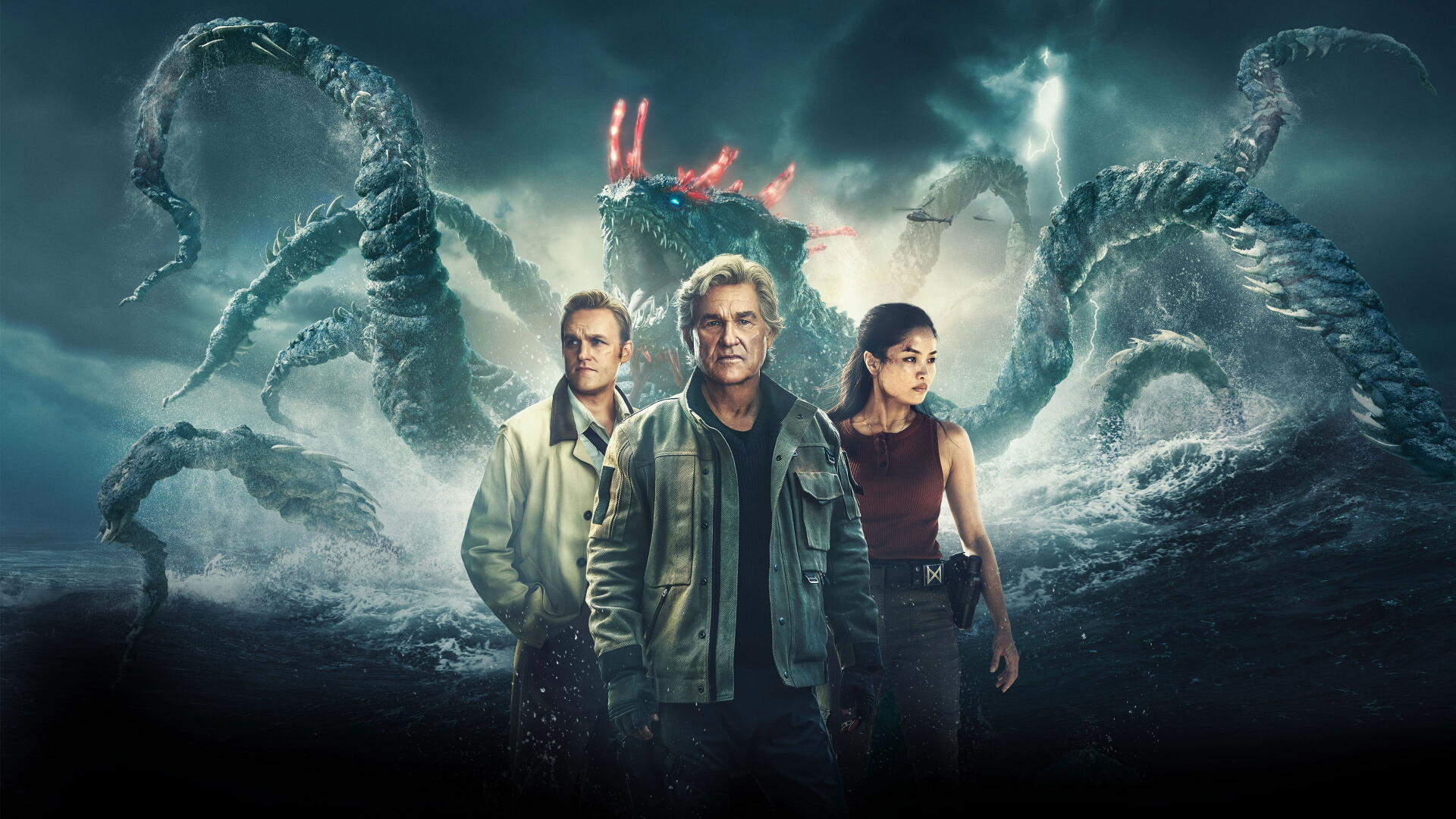 Monarch: Legacy of Monsters — 4K Ultra HD PC desktop wallpaper and background: three characters stand on a stormy shore as a glowing-eyed, tentacled kaiju rises behind them.