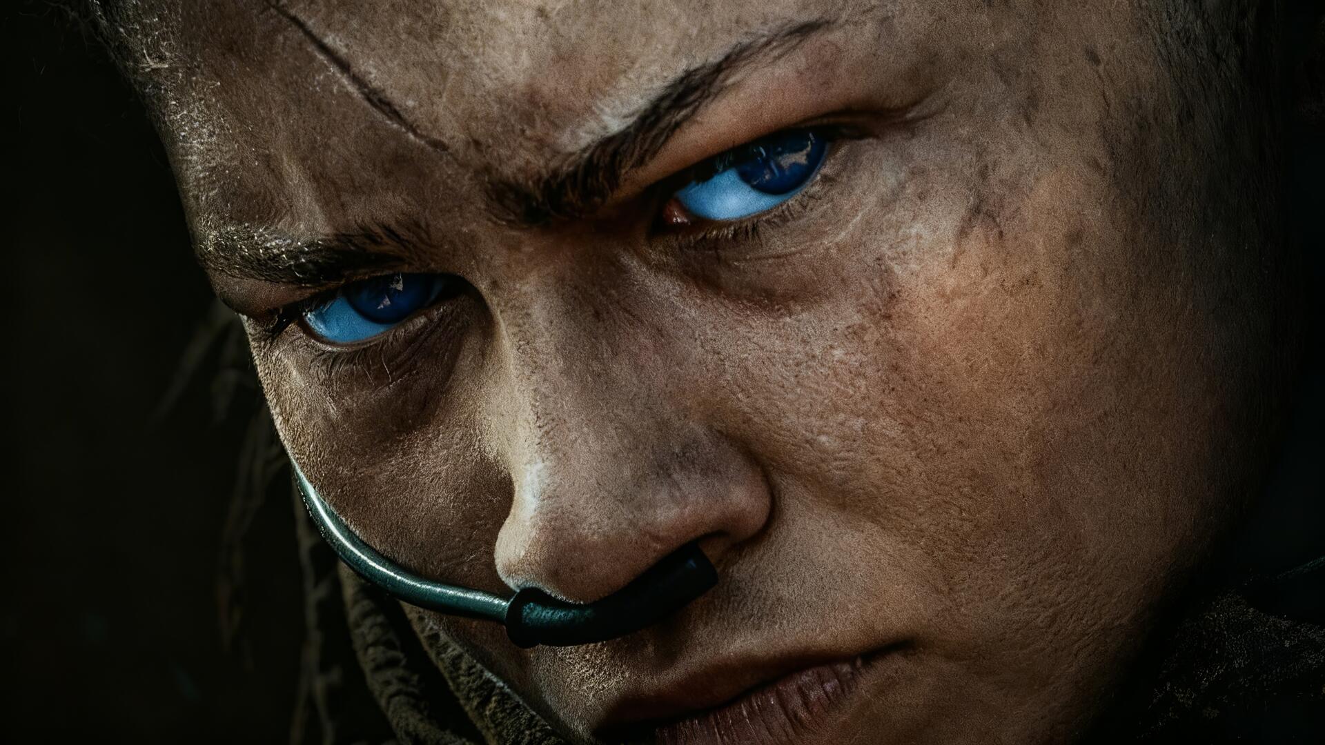 5K Ultra HD desktop wallpaper — intense close-up portrait with piercing blue eyes, dirt-smudged skin and a comms headset, cinematic Dune: Part Three vibe.