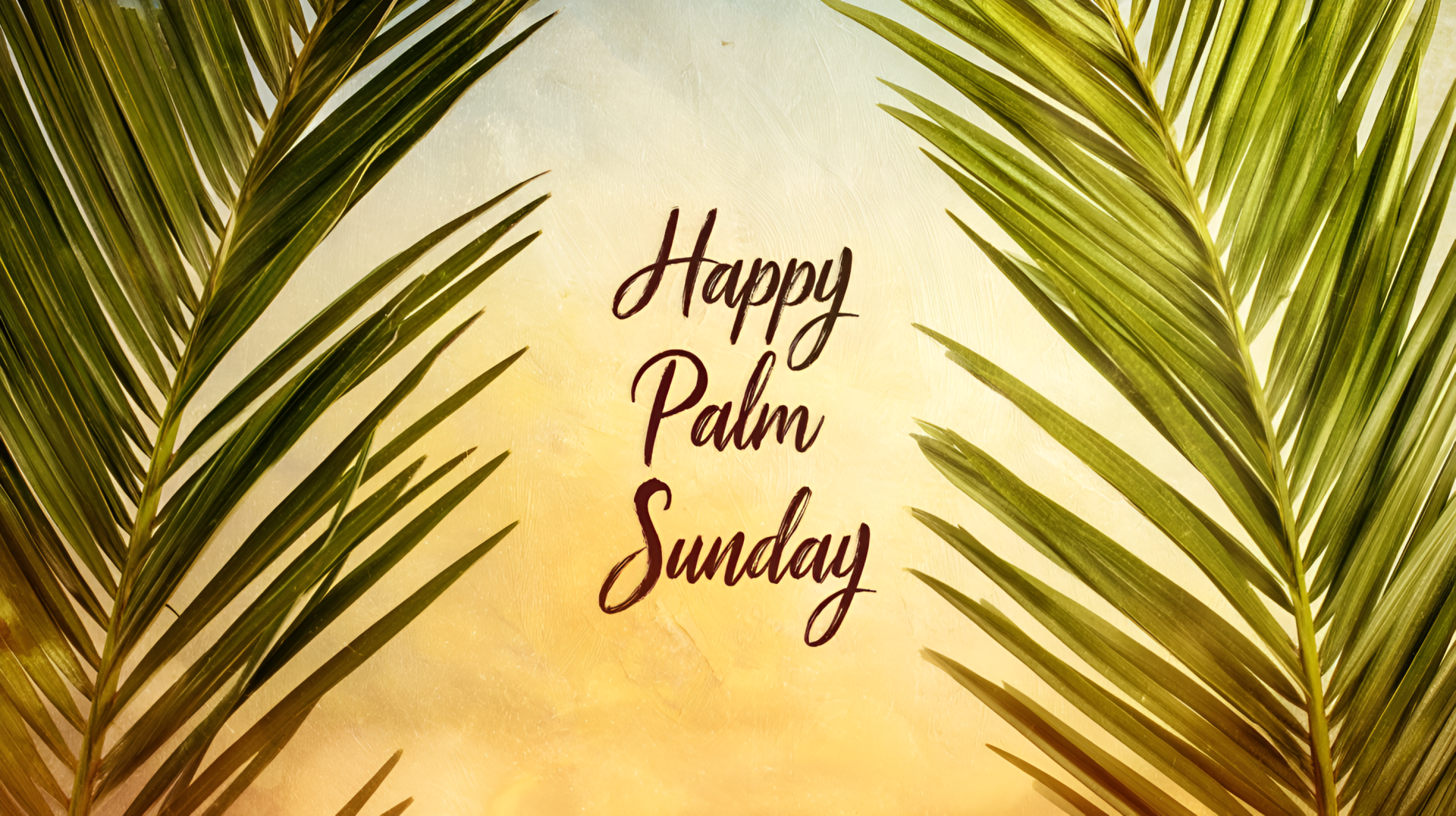 Religious Palm Sunday 2K Quad HD PC desktop wallpaper: warm sunrise background framed by palm fronds with centered Happy Palm Sunday script.