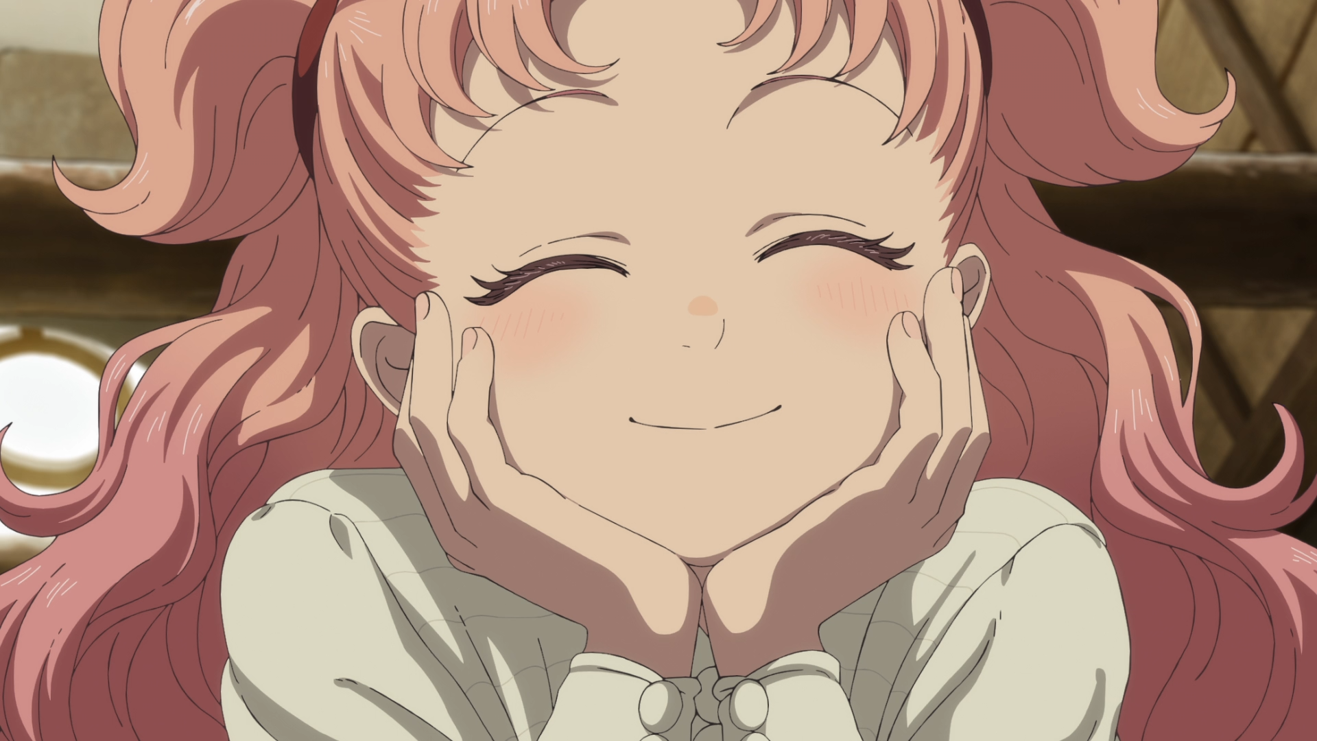 Anime HD desktop wallpaper of Tetia from Witch Hat Atelier: pink‑haired girl smiling with eyes closed, hands cupping her cheeks in a warm, cozy expression.