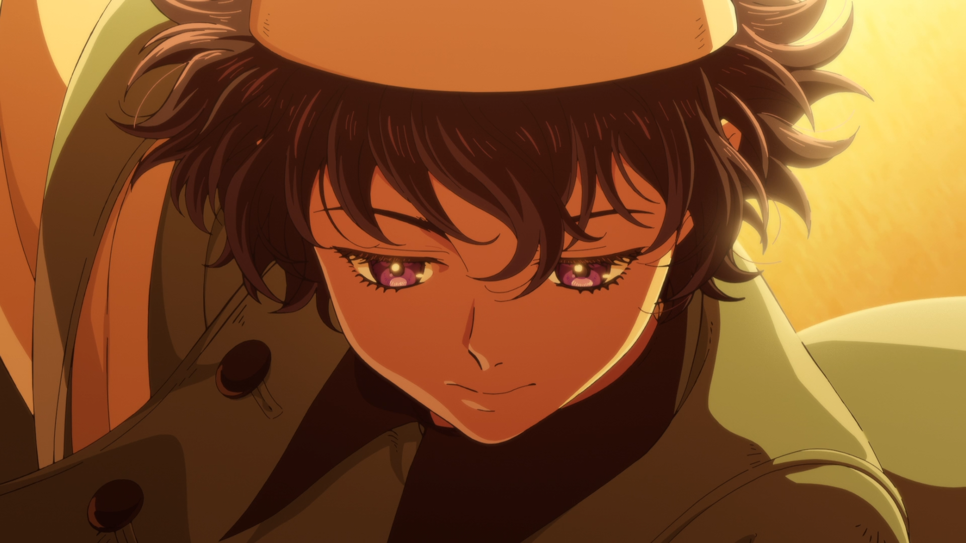 HD PC desktop wallpaper: warm-lit anime close-up of Agott Arkrome from Witch Hat Atelier, contemplative expression, tousled hair and glowing eyes.