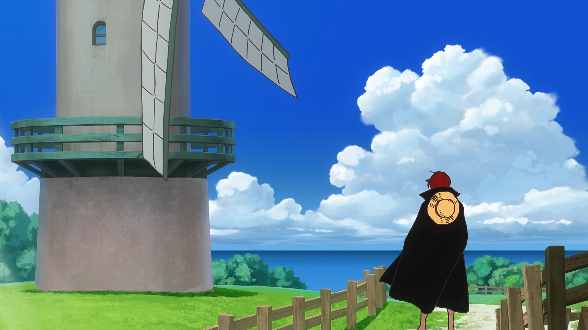 HD PC desktop wallpaper/background: Anime One Piece — Shanks in a black cloak and red hat stands by a coastal windmill, looking out over the blue sea beneath fluffy white clouds.