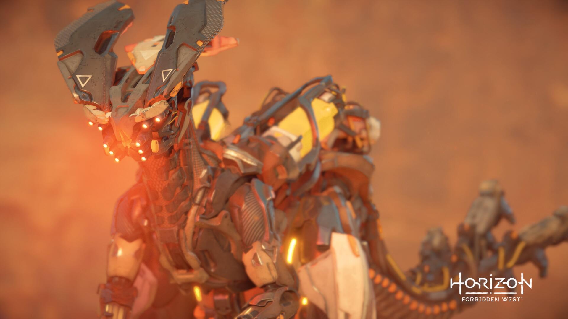 Horizon Forbidden West video game 4K Ultra HD PC desktop wallpaper: close-up of a glowing armored robotic creature in a dusty orange landscape, with smaller machines in the background.