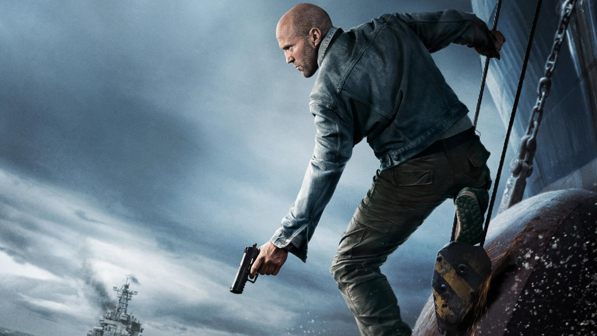 4K Ultra HD PC desktop wallpaper: mutiny on a stormy deck — a bald man in a jacket crouches on a rail with a pistol, warship silhouettes and dark clouds raging behind him.