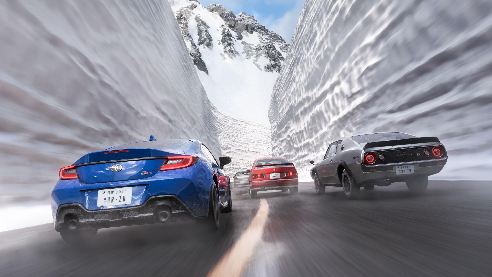 3 cars race down a wet mountain pass framed by towering snow walls in Forza Horizon 6; vibrant 4K Ultra HD PC desktop wallpaper/background showing rear-view action and high-speed motion.