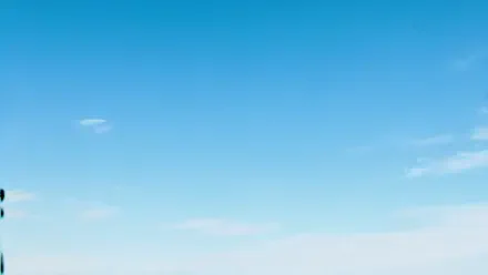 4K Ultra HD PC desktop wallpaper showing a vast clear blue sky with faint wispy clouds near the horizon.