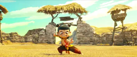 Anime movie wallpaper of Ne Zha striking a martial pose in a sunny grassy field with stone ruins; 2K Quad HD PC desktop background.