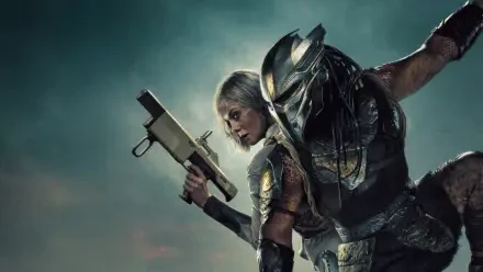 Predator: Badlands 4K Ultra HD PC wallpaper — armored Predator looming over a silver‑haired warrior woman holding a futuristic rifle in misty badlands.