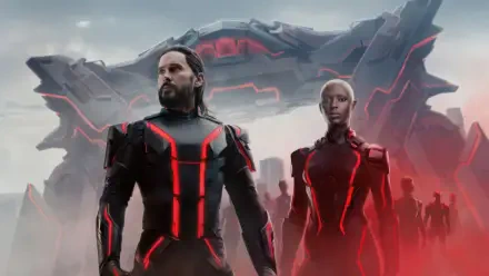 Tron: Ares 4K Ultra HD PC desktop wallpaper — two figures in black armor with red neon lines stand before a massive hovering craft and a red-lit crowd.