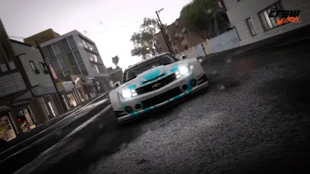 Low-angle Chevrolet Camaro racing through a rainy city circuit, wet reflections and motion blur — 2K Quad HD PC desktop wallpaper from The Crew.