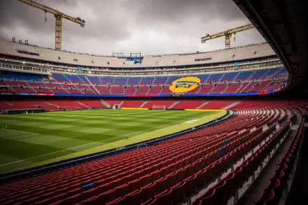 Camp Nou interior showing FC Barcelona's red-and-blue stands and lush soccer field, presented as a 4K Ultra HD PC desktop wallpaper/background.