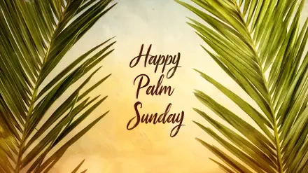 Religious Palm Sunday 2K Quad HD PC desktop wallpaper: warm sunrise background framed by palm fronds with centered Happy Palm Sunday script.