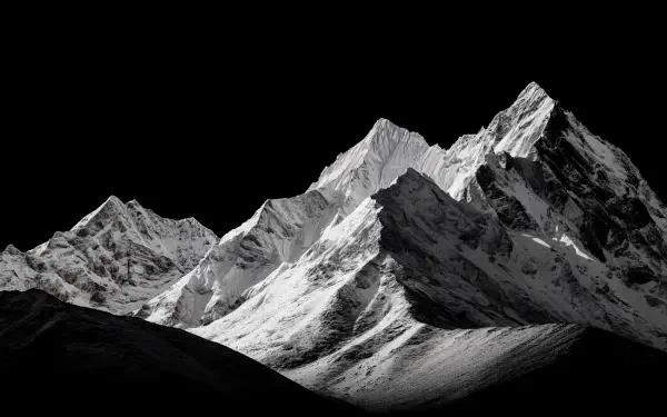 4K Ultra HD PC desktop wallpaper background of Earth's snow-covered mountain peaks in stark black-and-white against a deep, dark sky.