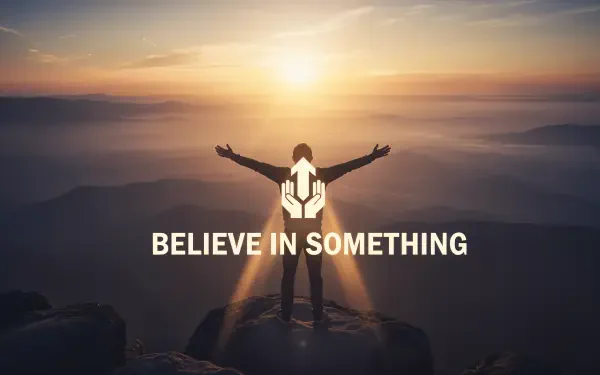 Motivational 4K Ultra HD PC desktop wallpaper: silhouetted person with arms outstretched on a mountaintop at sunrise, caption 'BELIEVE IN SOMETHING'.